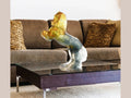 Daum Balthazar Ambre gris sculpture by Jean-Louis Sauvat on a coffee table