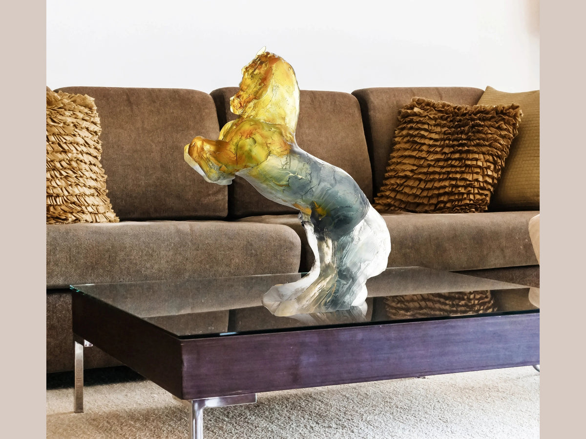 Daum Balthazar Ambre gris sculpture by Jean-Louis Sauvat on a coffee table