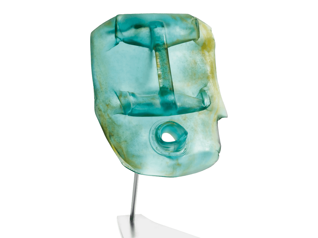 Blue Oil Head glass sculpture by Romuald Hazoumé for Daum on a metal stand