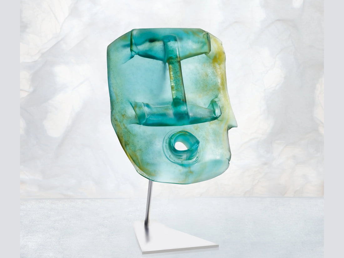 Blue Oil Head glass sculpture by Romuald Hazoumé for Daum on a metal stand