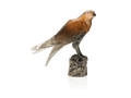 Daum Saker Falcon sculpture by Madeleine Van der Knoop on a textured base