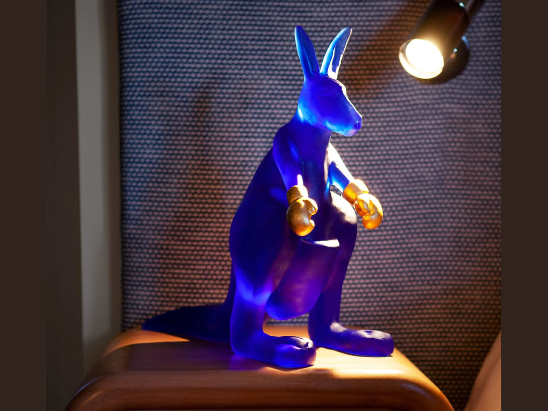 Blue Daum glass kangaroo figurine with gold boxing gloves by Yves Henry