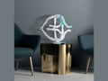 Daum La terre de Louis Derbré abstract glass sculpture on a gold side table