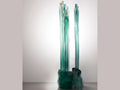 Daum Laurence Bonnel glass sculpture featuring tall, teal crystalline pillars