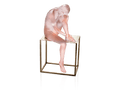 Daum Louison sculpture of a frosted pink glass figure sitting on a gold metal stand