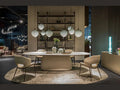 Cattelan Italia BOTERO Keramik dining set with oval ceramic table and modern chairs.