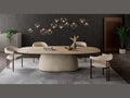 Cattelan Italia BOTERO Keramik oval dining table with cream pedestal and modern chairs.