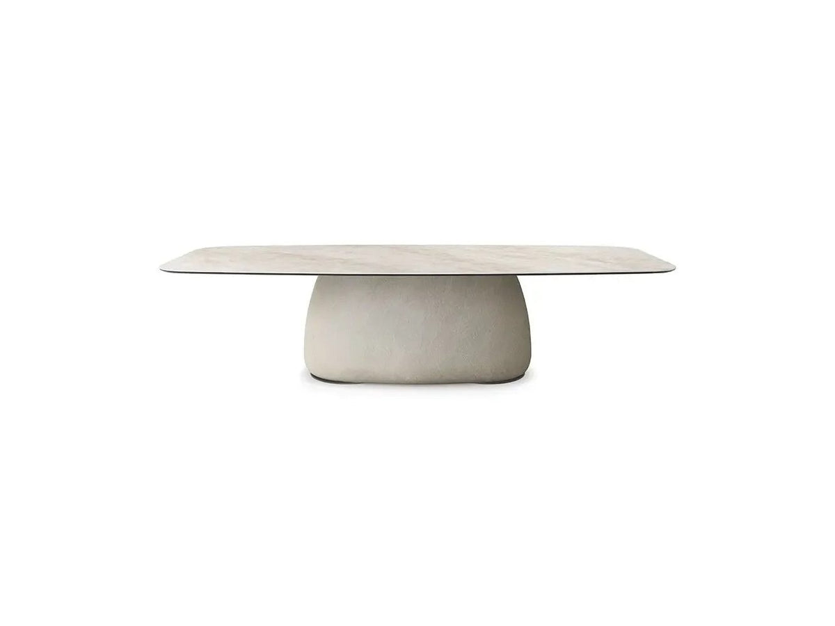 Cattelan Italia BOTERO ceramic dining table with a sculptural base.