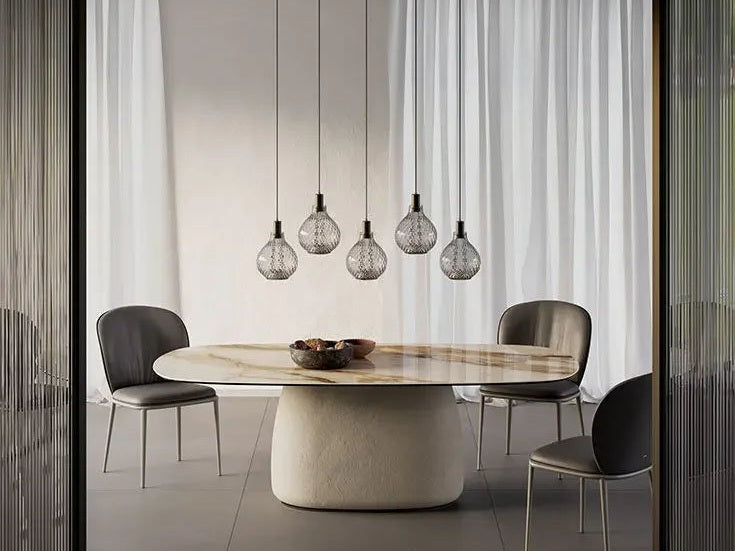 Cattelan Italia BOTERO Keramik dining set with marble table and glass pendant lights.