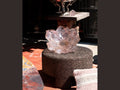Daum Camelia Coupe grand modèle Rose glass flower bowl on a dark stone pedestal