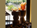 Daum Tulipe Coupe Ambre amber glass vases on wooden pedestals
