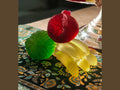 Daum Tutti Frutti Coupe featuring red, green, and yellow glass fruit sculptures.