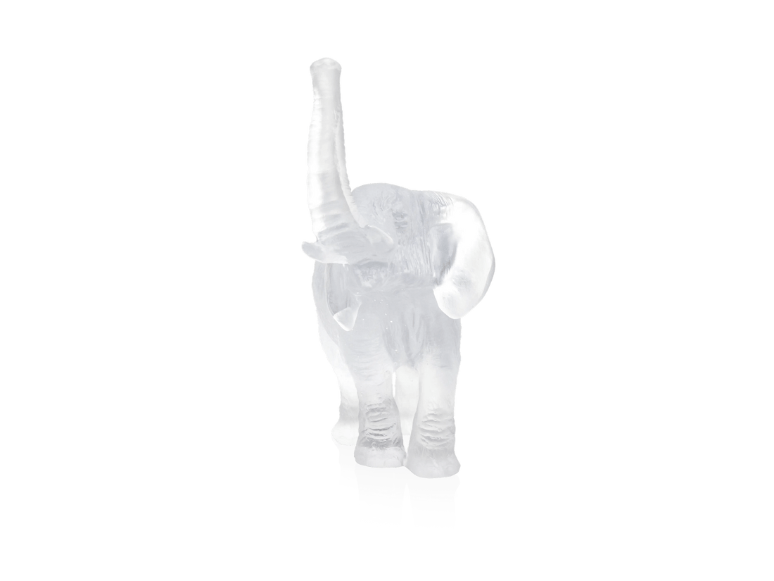 Daum clear glass elephant figurine by Jean-François Leroy with raised trunk.
