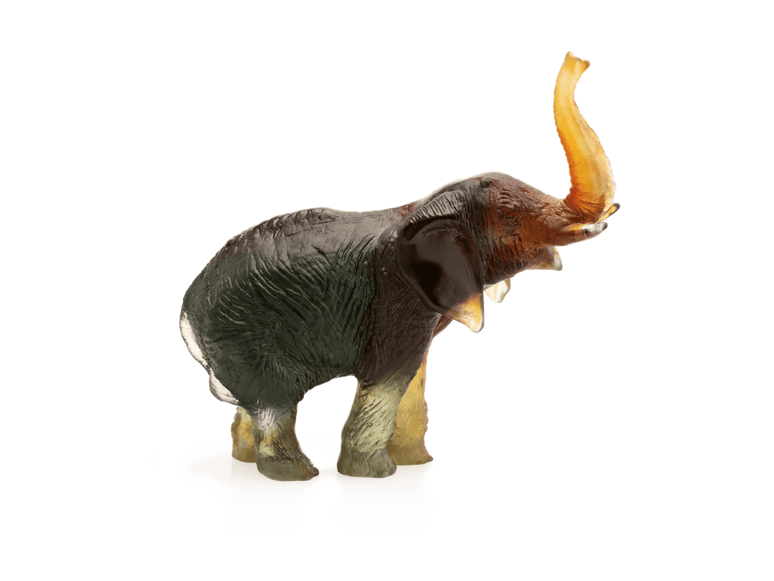 Daum medium elephant model in green and amber glass by Jean-François Leroy