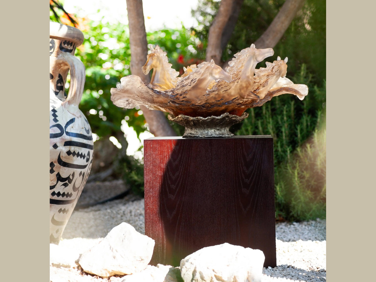 Daum Cavalcade Centerpiece in iced brown glass featuring stylized horses on a dark pedestal