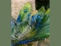 Daum Exotic Peacock Flower Centerpiece in vibrant green and blue glass.