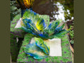 Daum Exotic Peacock Flower centerpiece with vibrant blue and yellow glass petals.