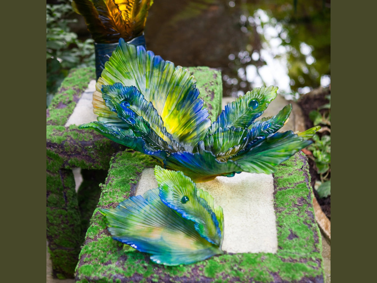 Daum Exotic Peacock Flower centerpiece with vibrant blue and yellow glass petals.