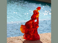 Daum Paloma de Nathalie Seguin glass sculpture in vibrant orange and red hues