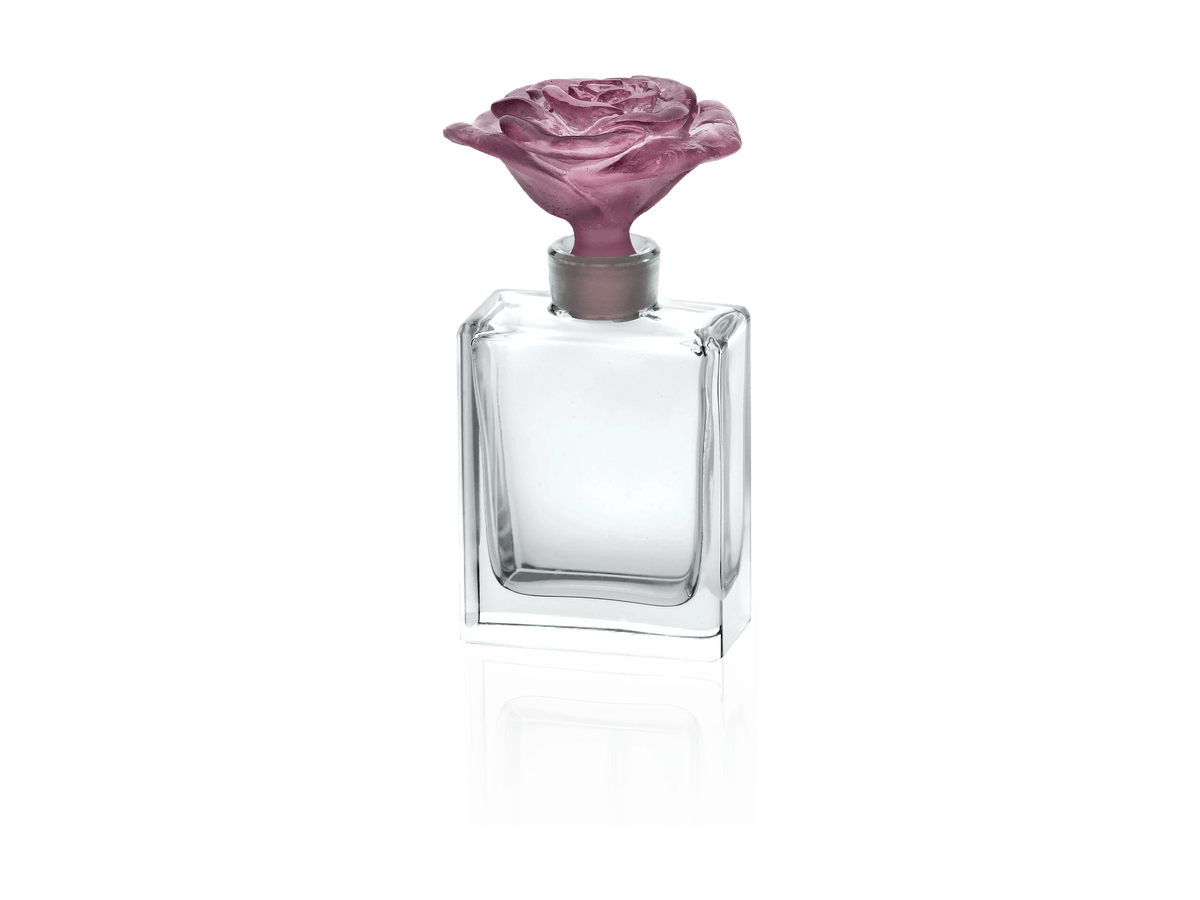 Daum Rose Passion perfume bottle with a pink rose-shaped stopper.