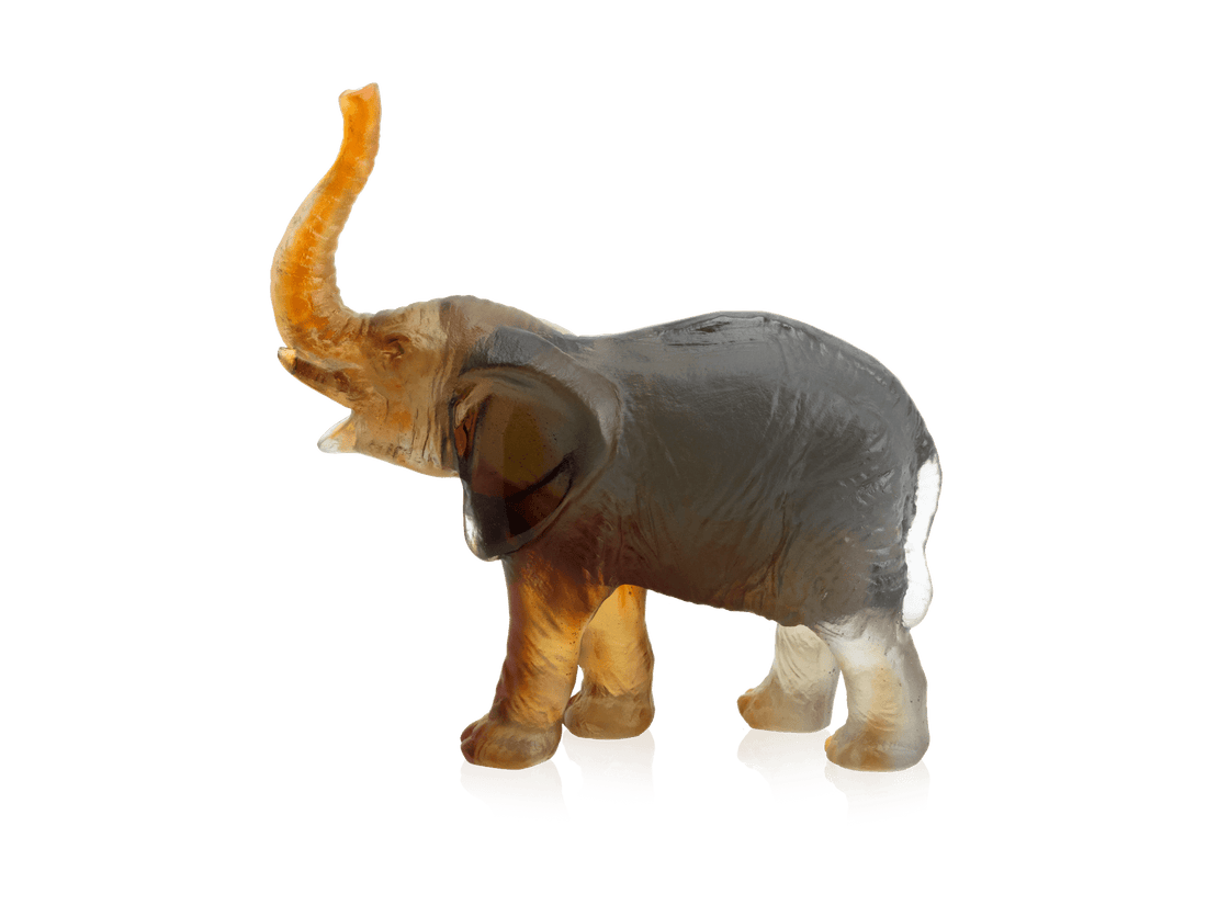 Small Daum glass model elephant in amber and green tones by Jean-François Leroy