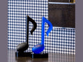Daum Timeless Bleue de Manu Katche 500ex musical note glass sculptures in black and blue.