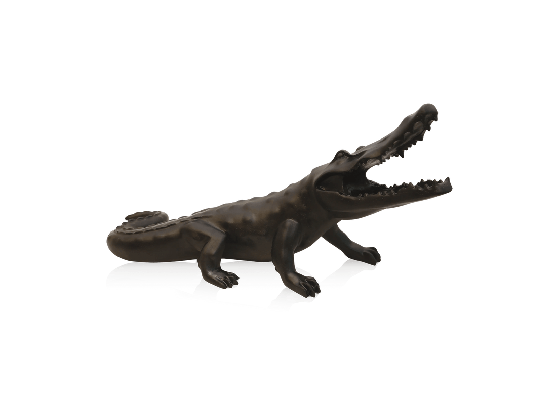 Wild Crocodile Noir sculpture by Daum, featuring a sleek black glossy finish and open jaws.