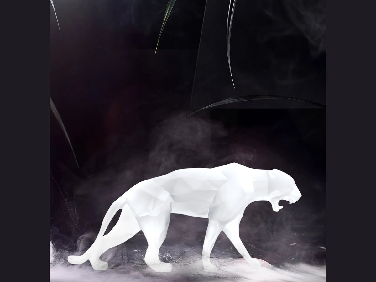 Daum Wild Panther Blanche by Richard Orlinski sculpture in a dark misty setting