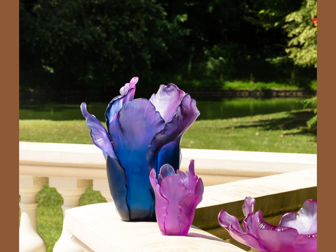 Daum Tulipe large blue glass vase with elegant petal-like curves.